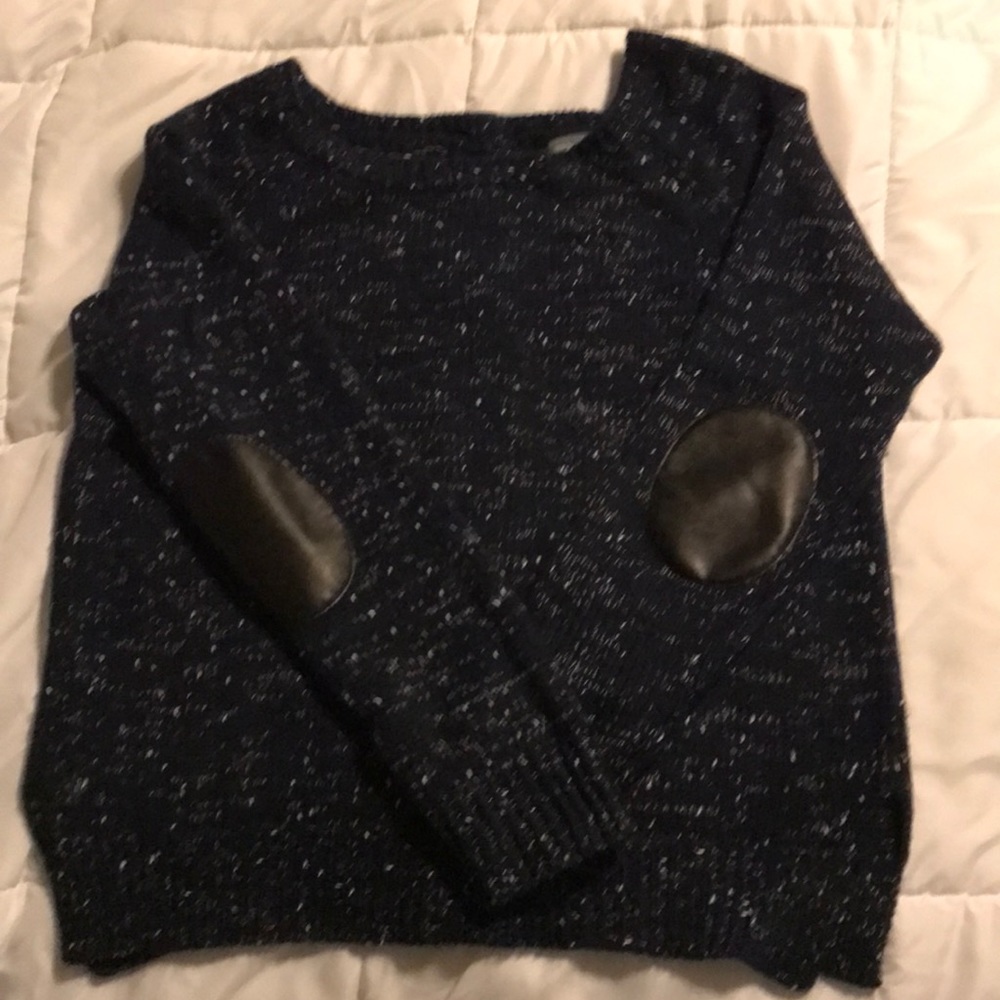 Sweater with elbow patches and buttons down back